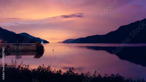 Bild auf Leinwand Loch Ness sunset lake reflections mountains