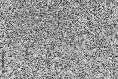 Small stones grain concrete detail slab cement surface structure wall texture backdrop gray background pattern abstract