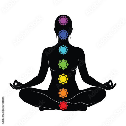 Meditating person with colorful chakra symbols on body
