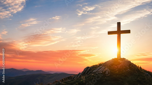 Golden Cross on Hill at Sunrise – Christian Faith Background