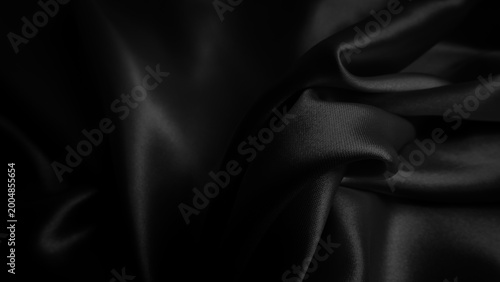 Black fabric background. Cloth wavy texture