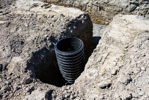 Cuadro en lienzo Septic Tank Riser, large black plastic corrugated pipe, installed in trench dug