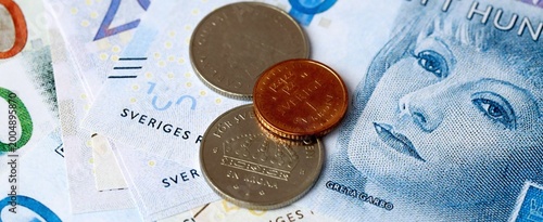 Swedish krona money bills and coins on table. Sweden cash of SEK currency close up