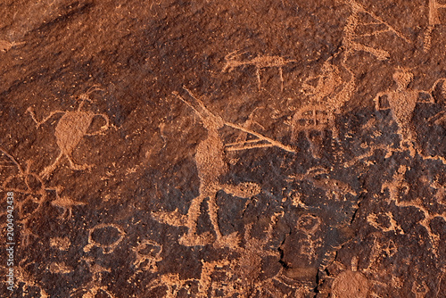 Ancient petroglyph of the Kokopelli flute players at Sand Island Petroglyphs, Utah
