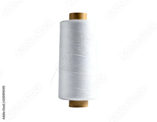White thread wound on a light brown spool