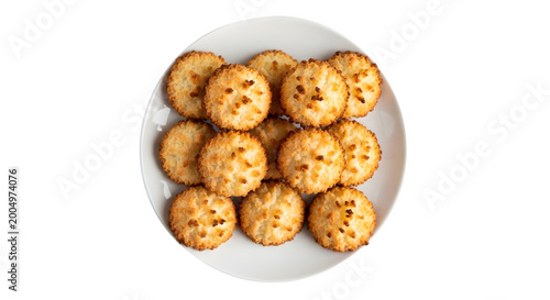 A plate of assorted cheese biscuits on a white surface with a transparent background