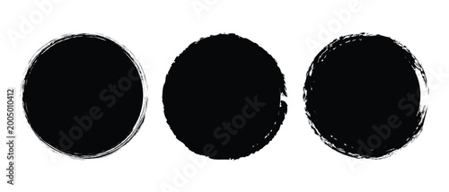 Set of black grunge circles shapes on a white background. Paint brush stamp collection. Vector brush circle. Grunge round shape.
