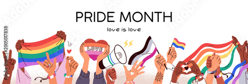 Pride Month banner. Hands with LGBT flags, homosexual symbols raised up for m...