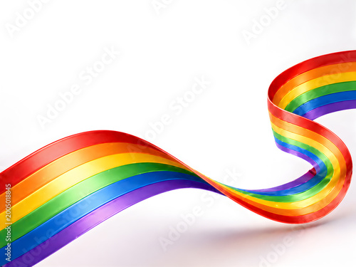 Vibrant rainbow ribbon flowing gracefully against a clean white background