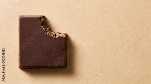 Isolated Chocolate Bar with Bite, Perfect for Banner, Ad, Menu, or Packaging Design