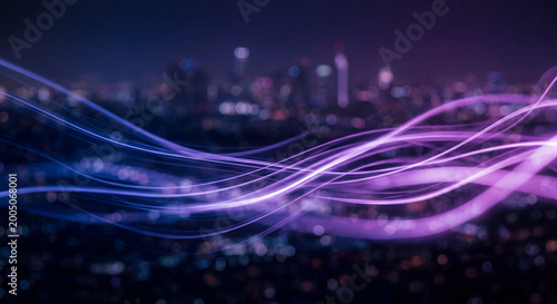Abstract light trails in purple and blue over a blurred city skyline at night.