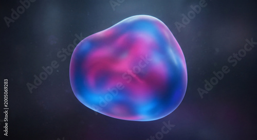 Close up of amorphous glowing blob with pink and blue colors on dark background.