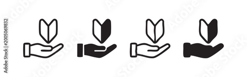 Fotografie Beginner or novice mark icon set held by a hand in various artistic styles, symb