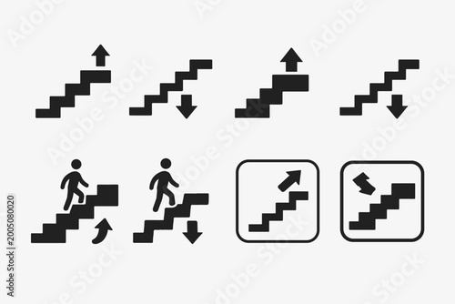 Comprehensive set of stairs icons and staircase signs with up and down arrows for navigation. Vector illustration of person silhouette climbing steps and descending for wayfinding signage.