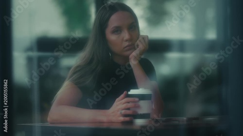 Calm Female Portrait. Serene Female Figure Gazing Thoughtfully Into Distance Under Gentle Light