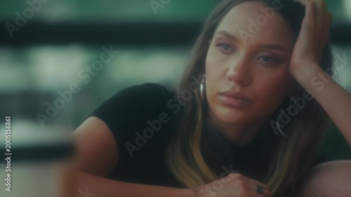 Calm Female Portrait. Serene Female Figure Gazing Thoughtfully Into Distance Under Gentle Light
