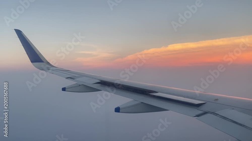 Airplane Wing Above Clouds During Sunset Sky View