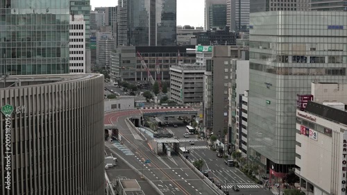 Tokyo Scene  :  Global Commercial Area Surrounded by Towering Skyscrapers with Layers of Station, Shopping Mall, Arterial Roads, and Elevated Highways  |  Yurakucho, Ginza, Tokyo, Japan
