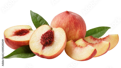 Obraz na plátně Ripe juicy peaches with green leaves and sliced segments