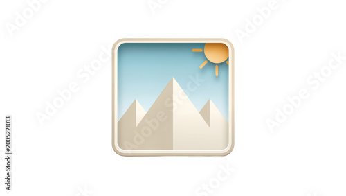 Rounded silver icon depicting snowy mountains and sunlit sky