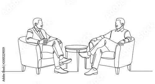 Two men having a casual conversation on armchairs