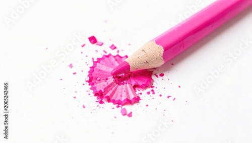 A close-up shot of a pink pencil with a matching eraser