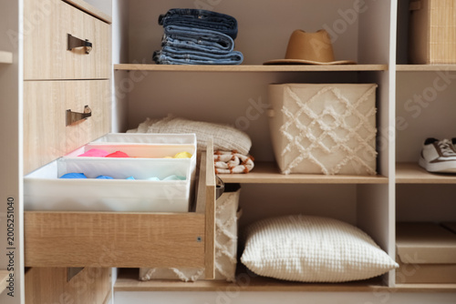 Open drawer with organized ...