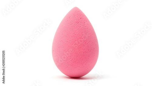 Obraz na płótnie A pink makeup sponge on a white background