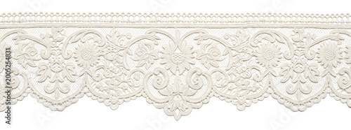 Fotografía Decorative white lace trim with elegant floral motifs.