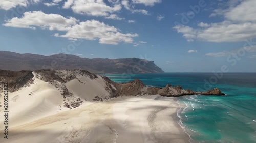 Sand Dunes Overlooking Turquoise Coastal Bay and Mountains. Detwah Lagoon, Sokotra, Yemen.