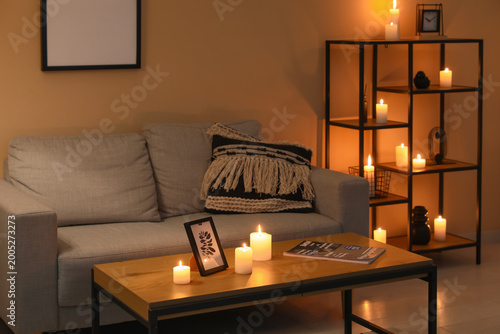 Burning candles, magazine a...