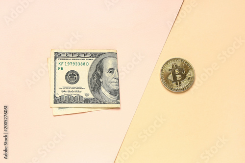 Bitcoin and dollar banknote...