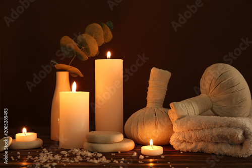 Glowing candles with spa st...