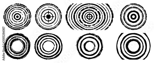 Concentric circular targets and tree ring shapes with distressed grunge stamp texture