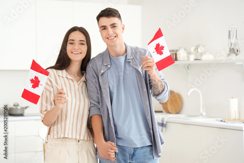 Happy young couple holding ...