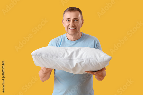 Mature man with soft pillow...