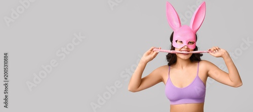 Playful young Asian woman i...