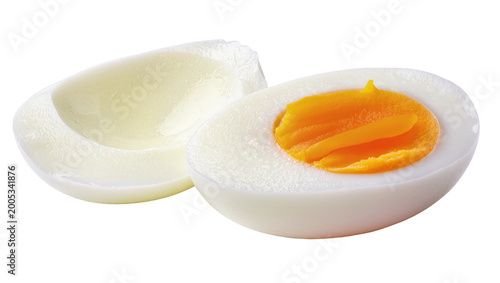 Vászonkép Hardboiled egg halves with bright yellow yolk closeup