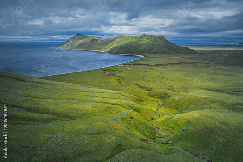Aerial view of Umnak Island coastline and volcanic tundra, Aleutian Islands, Alaska