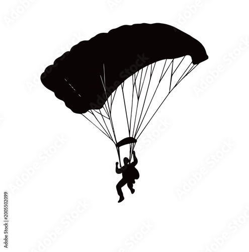 Slika na platnu Silhouette of a parachutist descending with parachute, extreme sport and adventure concept