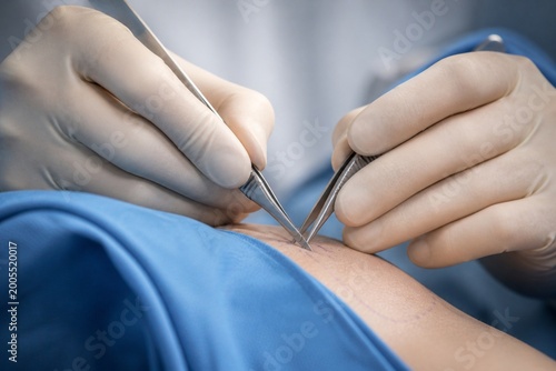 surgeon holding a syringe