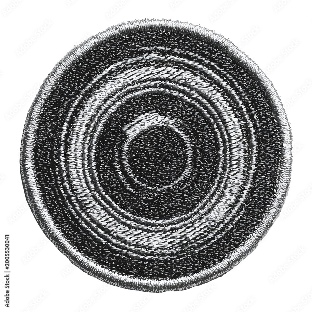 Naklejka premium Close-up textured circular pattern with concentric rings and rough edges
