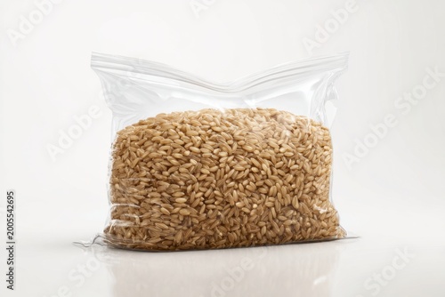 Bag of whole grains on white background studio lighting