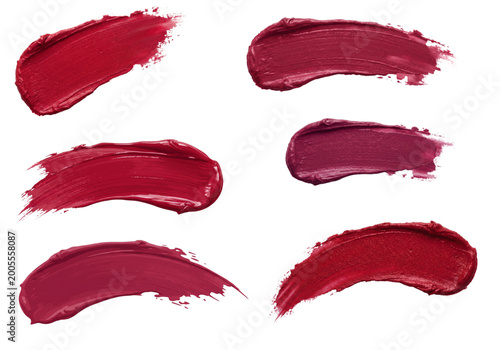 Set of red and burgundy lipstick swatches with creamy texture cosmetic smears vector illustration on white background