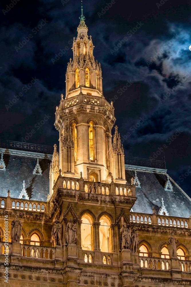 Fototapeta premium Illuminated Gothic Tower in Vienna at Night.
