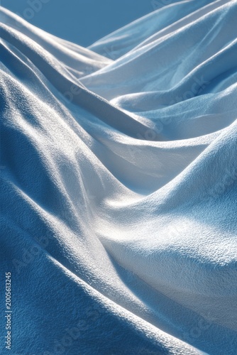 Abstract Snow Dunes Forming Elegant Curves in Winter Light