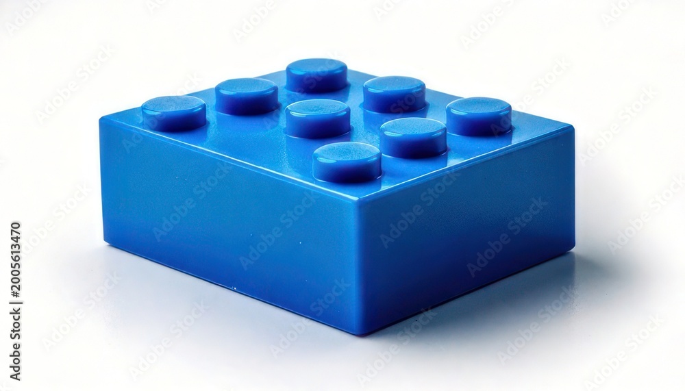 Fototapeta premium Vibrant Blue Lego Brick Isolated on White Background - Educational Toy Concept.