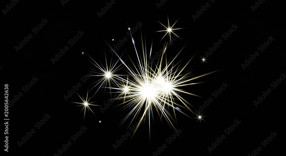 Fototapeta premium A cluster of sparkling fireworks explodes against a black background. The bright, golden sparks radiate outwards, creating a dynamic and energetic display.