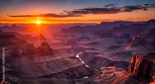 Sunset over Grand Canyon landscape formation.
