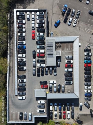 Aerial top down view looking at parked cars. 